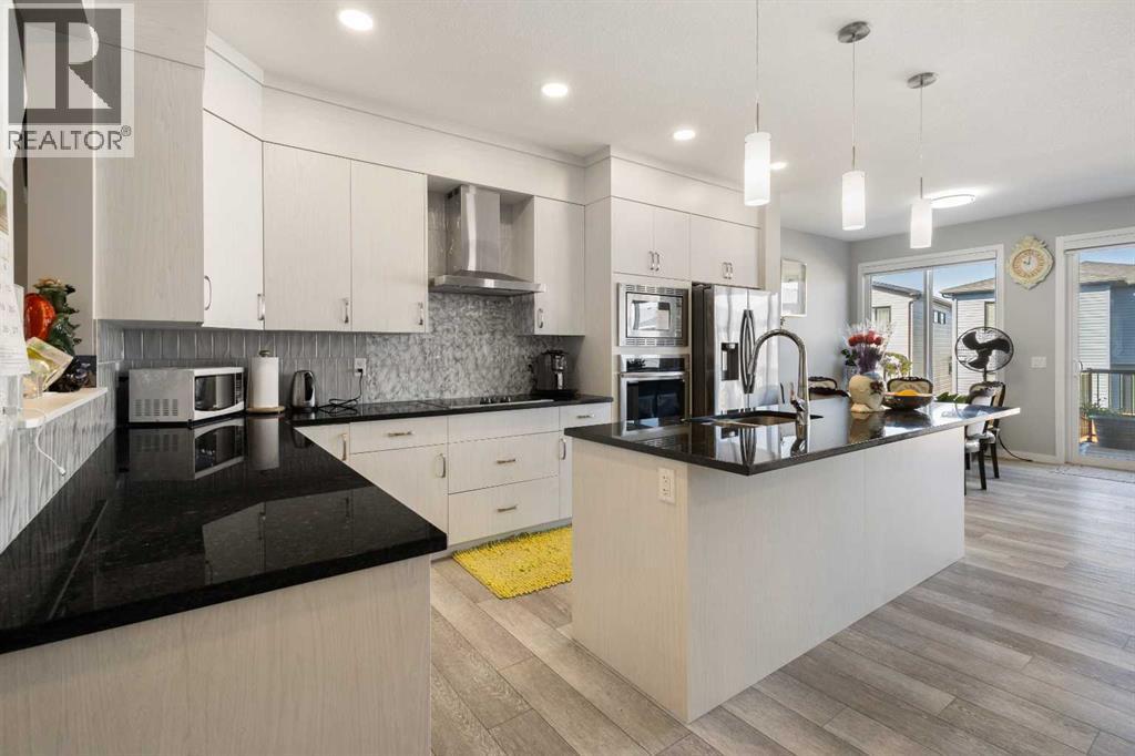 35 Lucas Passage NW, Livingston, Calgary photo 4