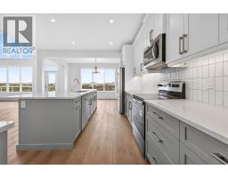 Family room - 813 Chelsea Village, Chestermere, AB T1X3H5 Photo 15