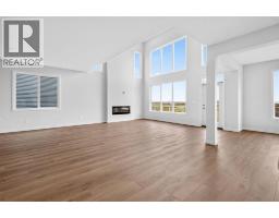 Living room - 813 Chelsea Village, Chestermere, AB T1X3H5 Photo 6