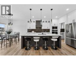 Family room - 67 Lakes Estates Circle, Strathmore, AB T1P0B6 Photo 15