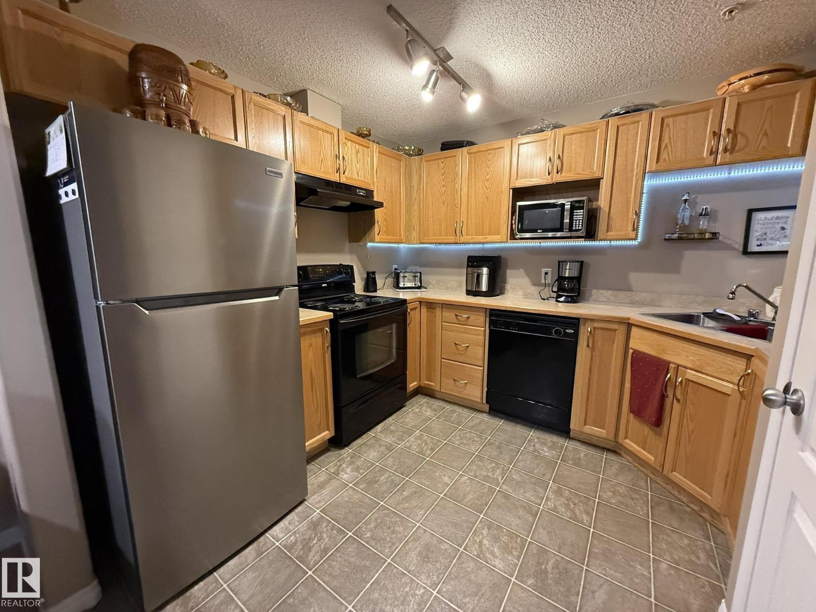 #205 3425 19 ST NW - Image 11
