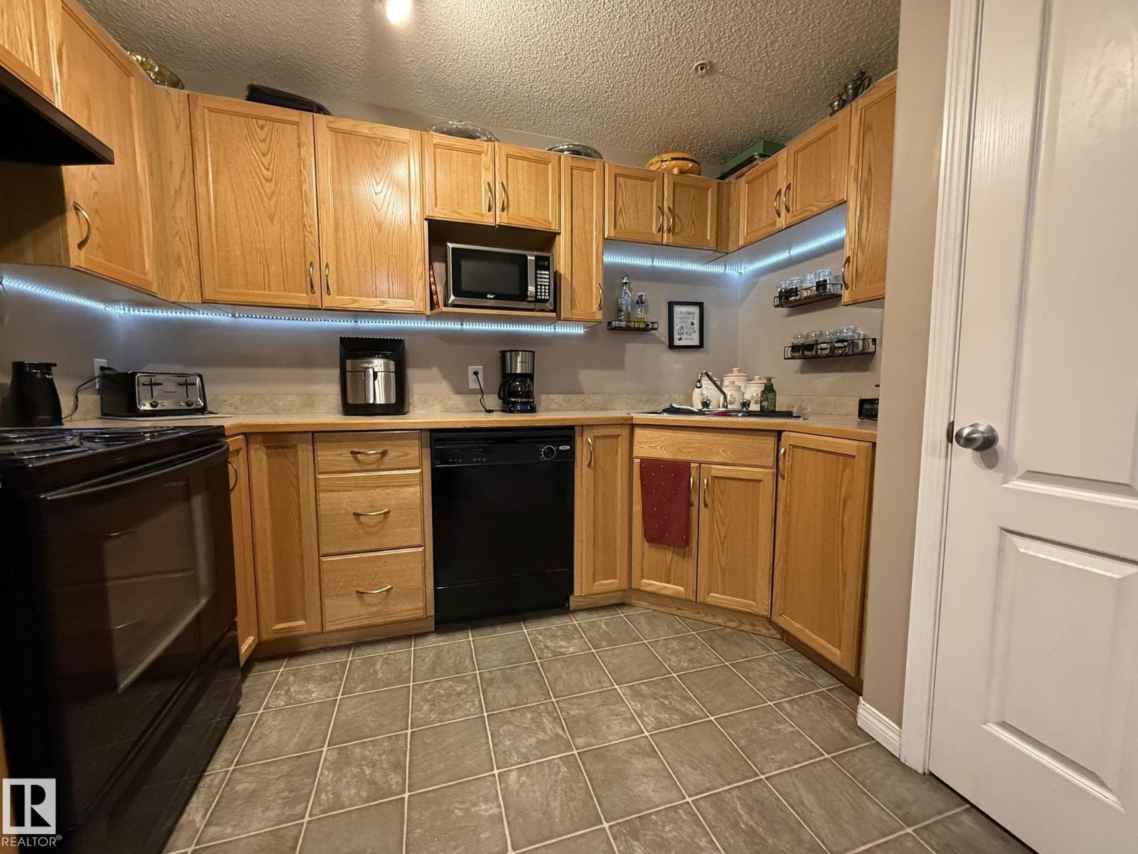 #205 3425 19 ST NW - 12
