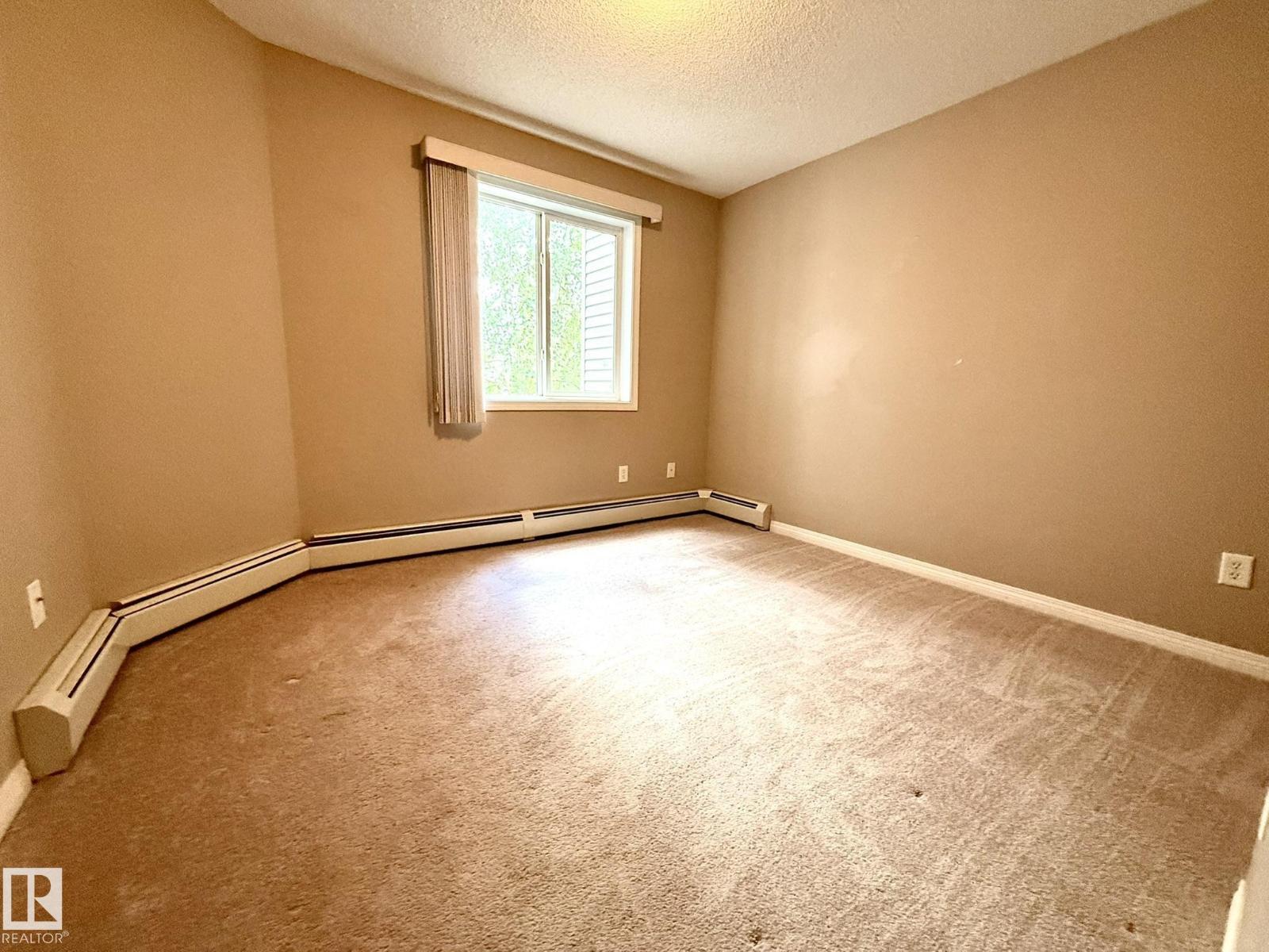 #205 3425 19 ST NW - 23