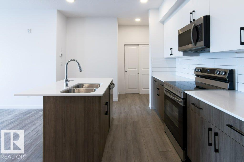 #206 9211 228 ST NW - 6