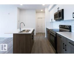 Laundry room - #206 9211 228 St Nw, Edmonton, AB T5T4T1 Photo 6