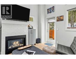 Living room - 501h, 3000 Stewart Creek Drive, Canmore, AB T1W0G5 Photo 6