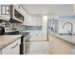 Kitchen - 18 Maple Bush Avenue, Toronto, ON M9N1S6 Photo 13