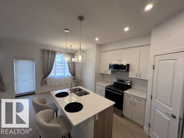 20936 16 AV NW - Image 4
