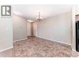 Living room - 206, 69 Ironstone Drive, Red Deer, AB T4R0J8 Photo 10