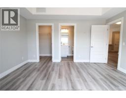 Living room - 728 Brownstone Drive Unit# 202, Lakeshore, ON N9K0C4 Photo 9