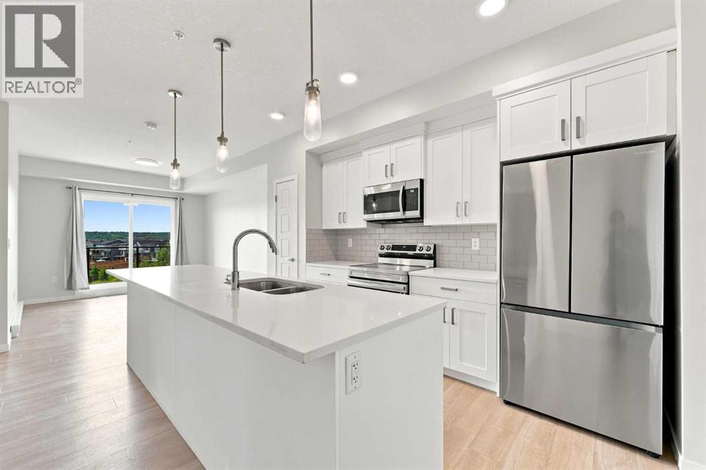 #1307 42 Cranbrook Gardens SE - 6
