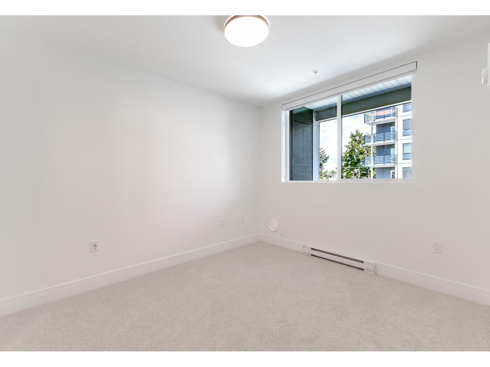 319 20769 FRASER HIGHWAY, Langley