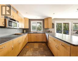 Laundry room - 8905 Russet Drive, Vernon, BC V1B2B7 Photo 12