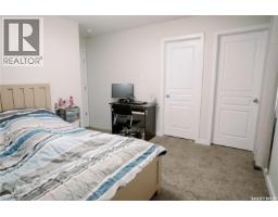 Family room - 205 Reddekopp Lane, Warman, SK S0K4S3 Photo 9