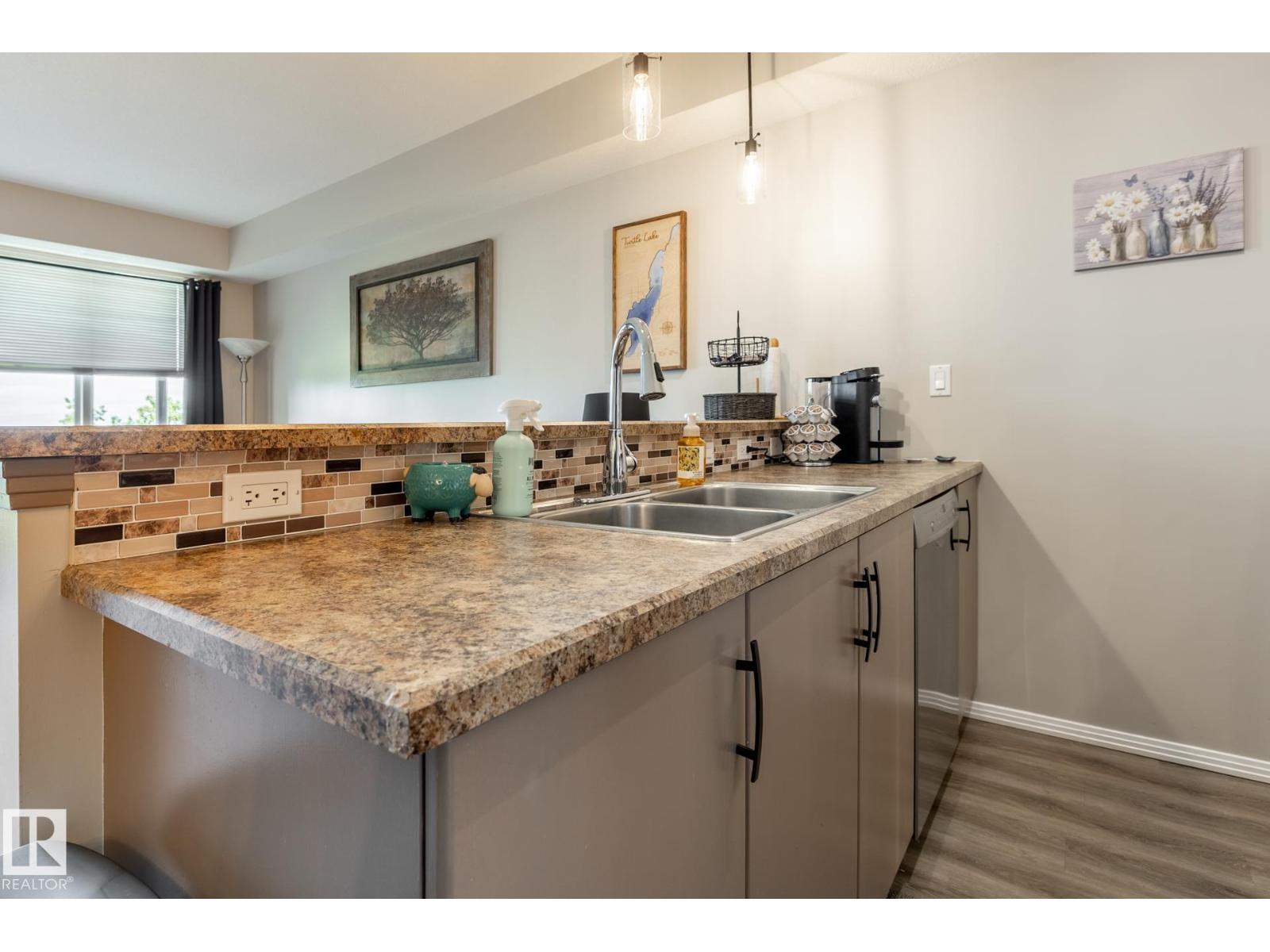 #305 9940 SHERRIDON DR - Image 13