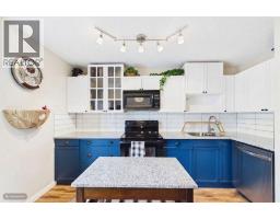 Family room - 24, 800 Bowcroft Place, Cochrane, AB T4C1B9 Photo 6
