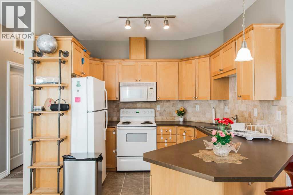 #203 9225 LAKELAND DR - 4