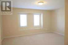 Bedroom 2 - D22 - 619 Wild Ginger Avenue, Waterloo, ON N2V2X1 Photo 6