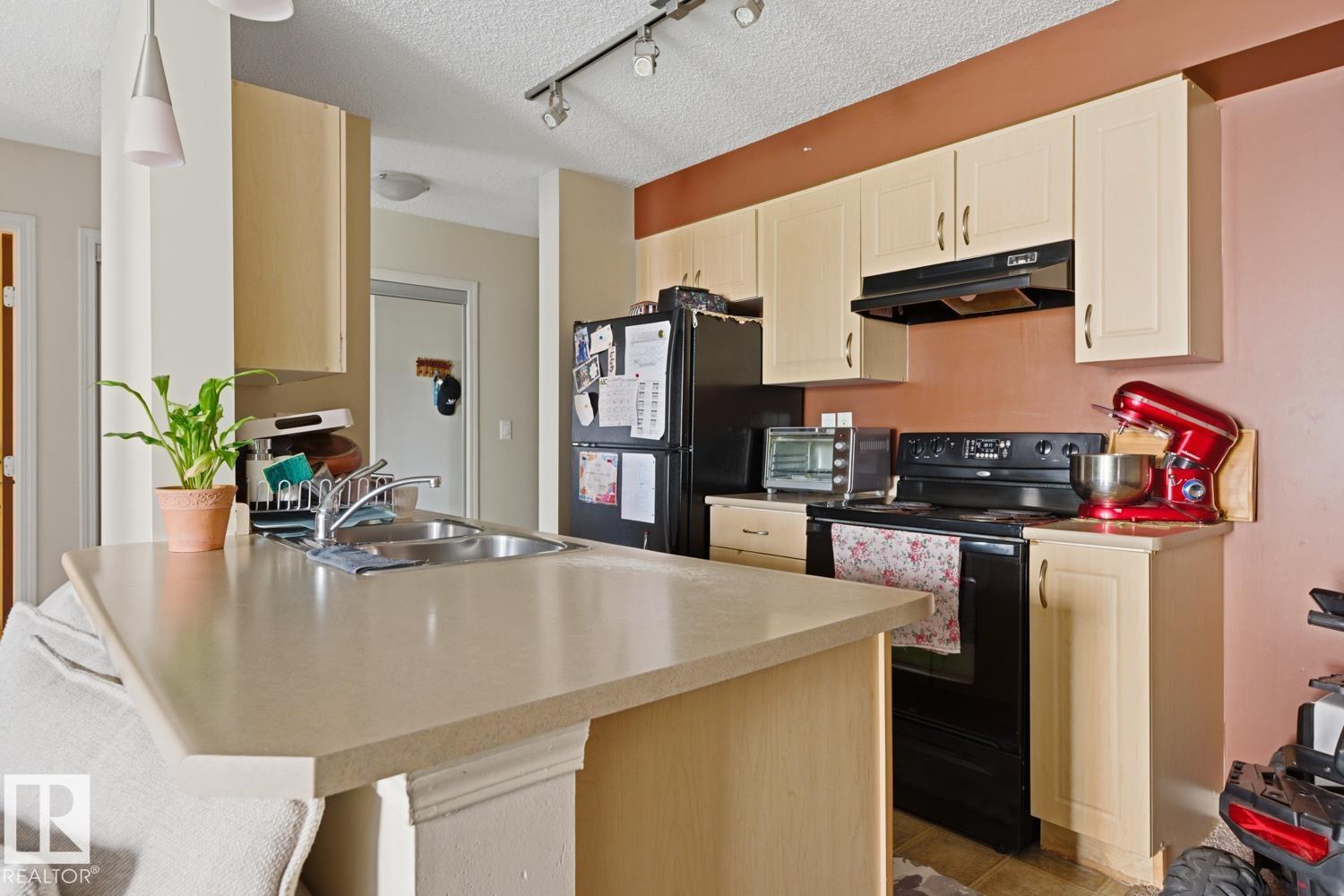 #106 13907 136 ST NW - 27