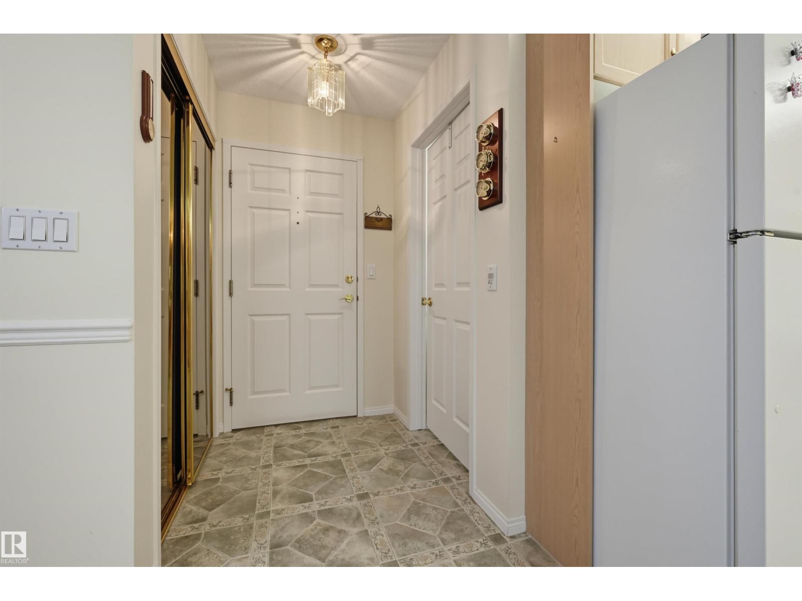 #211 10915 21 AV NW - 4