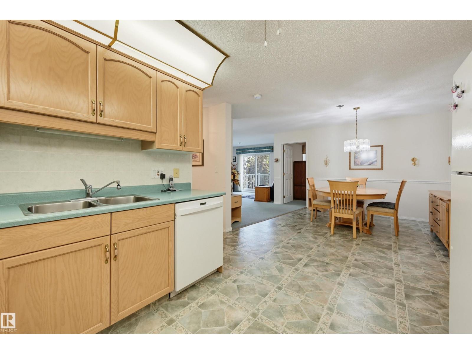 #211 10915 21 AV NW - 8