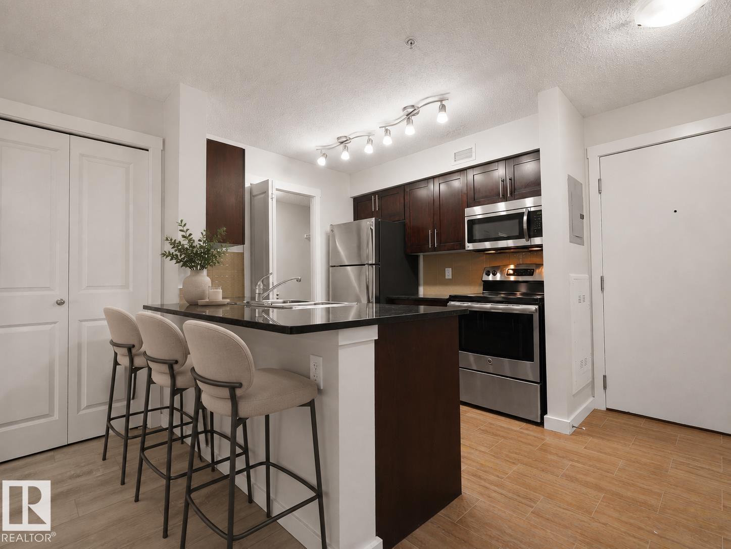 #205 5816 MULLEN PL NW - Image 3