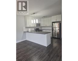 Primary bedroom of 401 6798 WESTGATE AVENUE · Prince George, BC