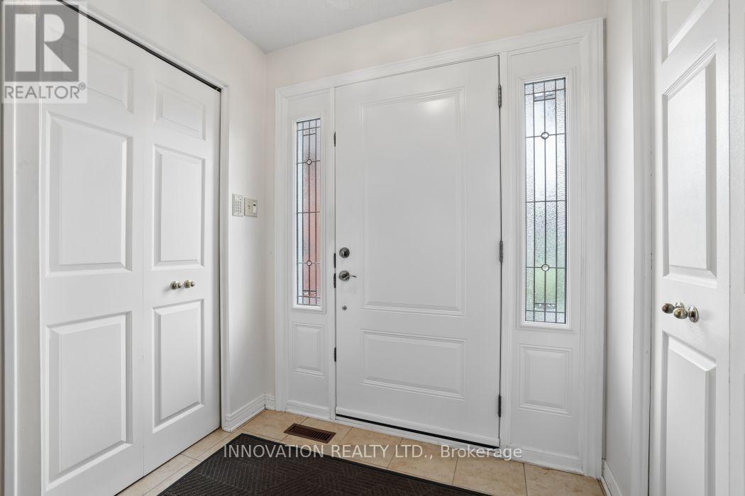 Spacious foyer with closet