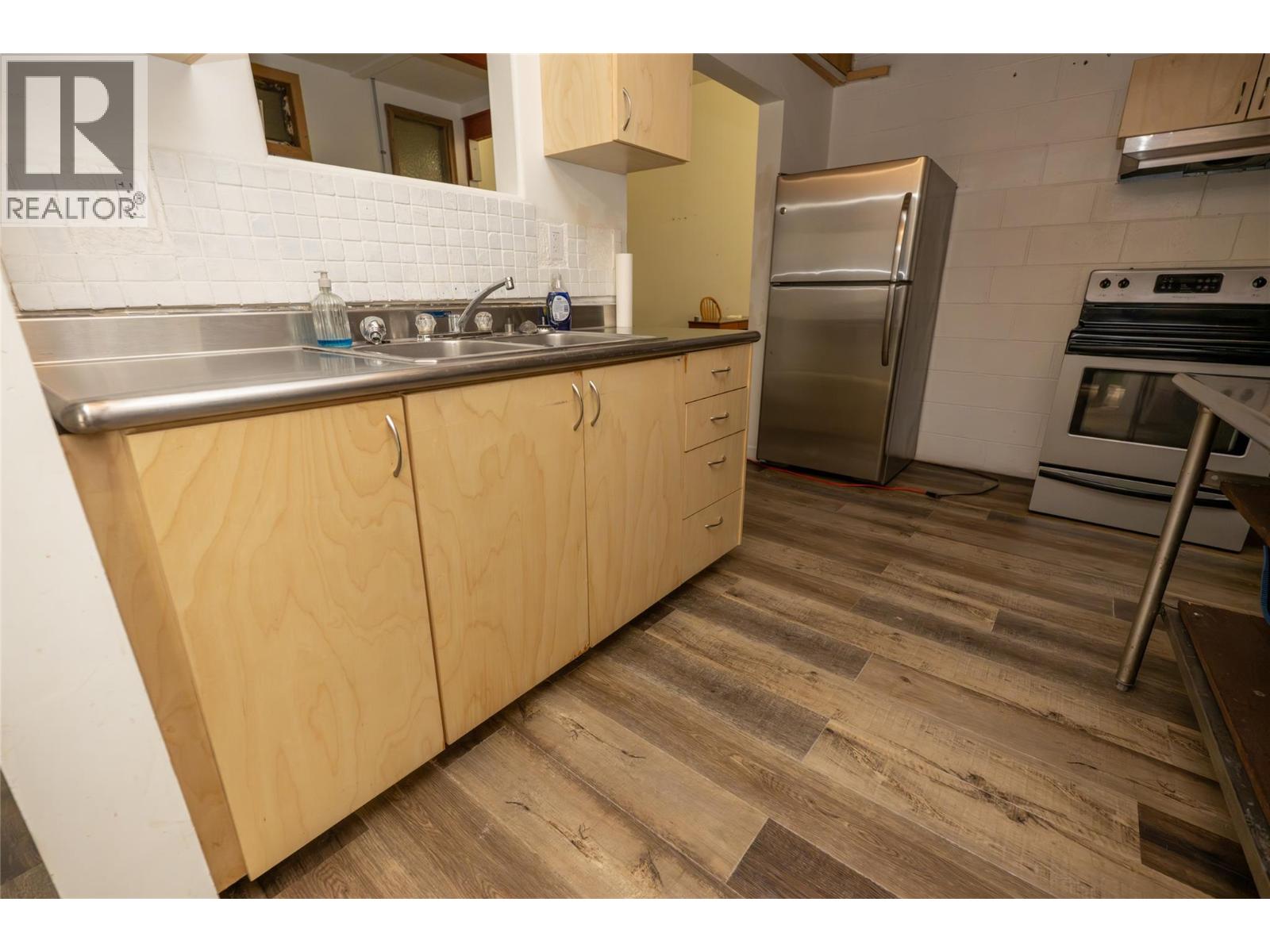  302 Copper Avenue South, Greenwood - Image 1