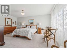 14 Riviera View, Cochrane, AB T4C0Y7 Photo 30