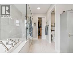 14 Riviera View, Cochrane, AB T4C0Y7 Photo 34