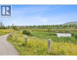 14 Riviera View, Cochrane, AB T4C0Y7 Photo 50