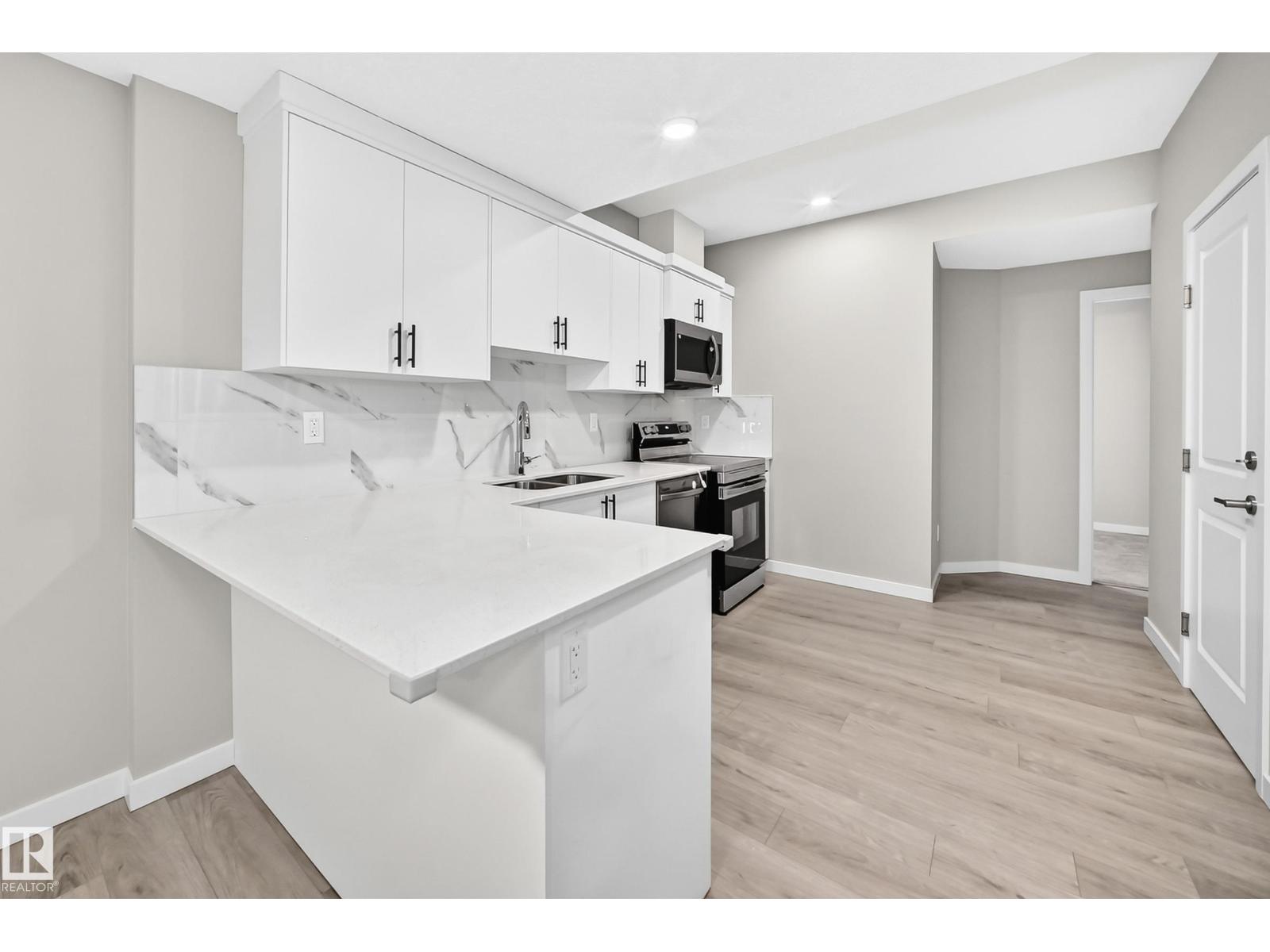 7056 182 AV NW - 55