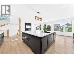 Den - 79 Sundown Way, Cochrane, AB T4C0H4 Photo 6