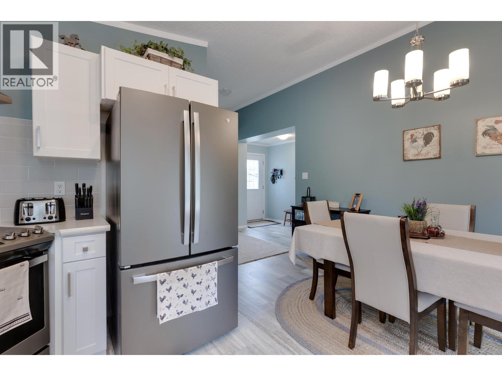 Photo 11 of 32 — 8340 CANTLE DRIVE · Prince George, BC