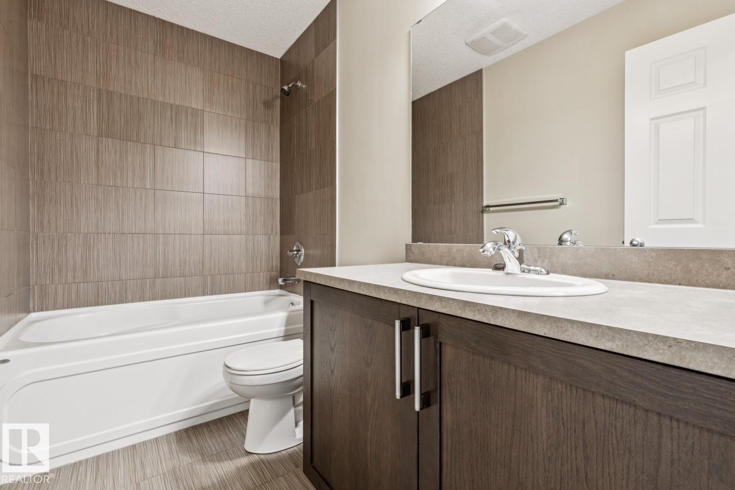 8311 ELLIS CR NW - Image 25
