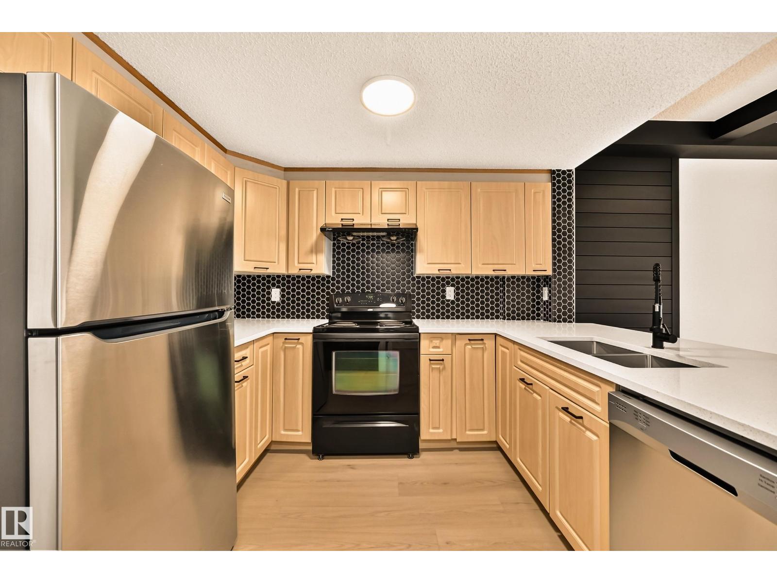 #323 6315 135 AV NW - 4