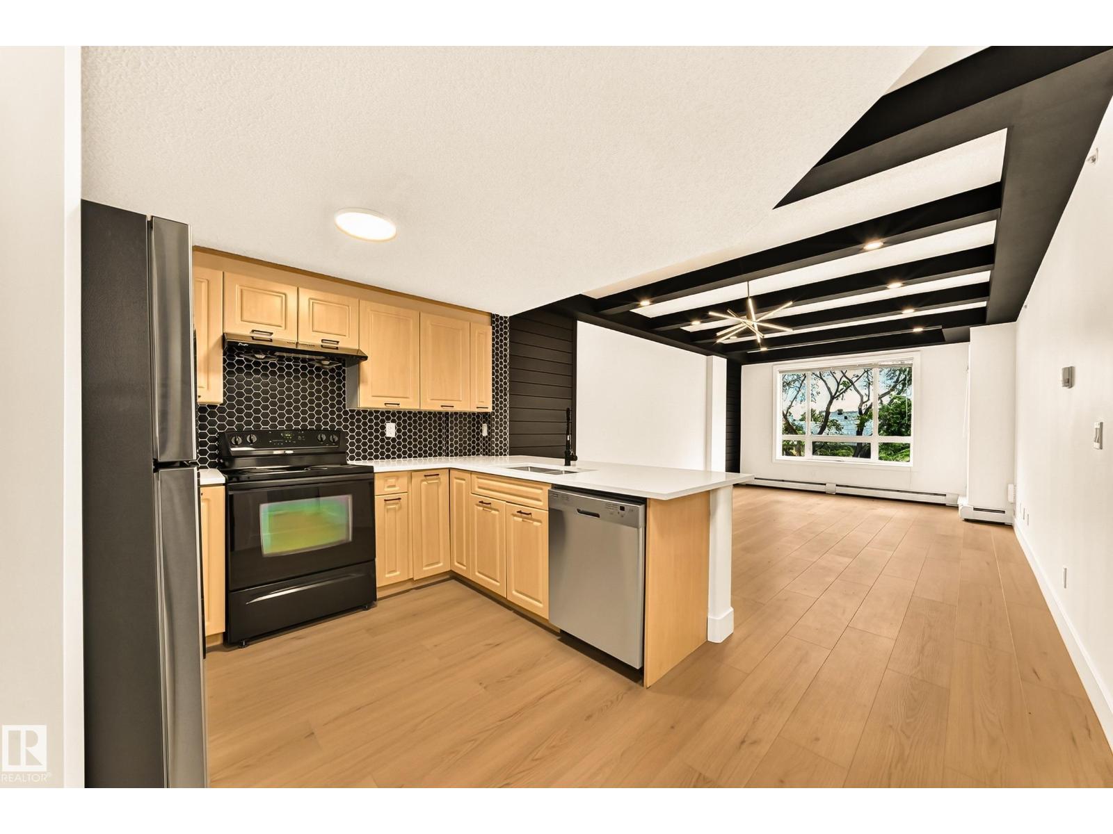 #323 6315 135 AV NW - 3