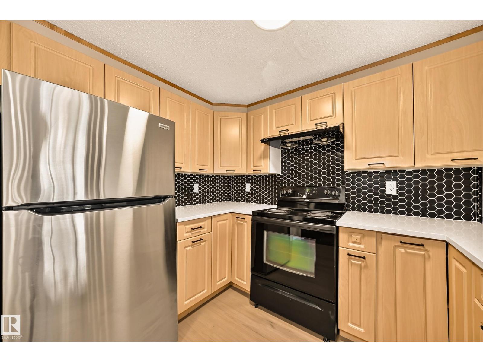 #323 6315 135 AV NW - 5