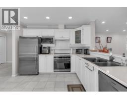207 1500 Ostler Court, North Vancouver, BC V7G2S2 Photo 7