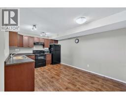 Living room - 302, 8 Bayside Place, Strathmore, AB T1P0E1 Photo 6