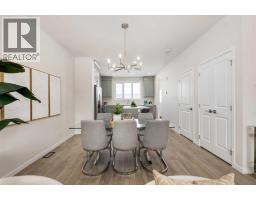 Living room - 87 Bluerock Terrace Sw, Calgary, AB T2Y0Y3 Photo 10