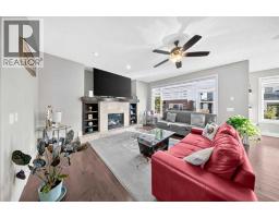 Living room - 160 Kinniburgh Circle, Chestermere, AB T1X0P8 Photo 7