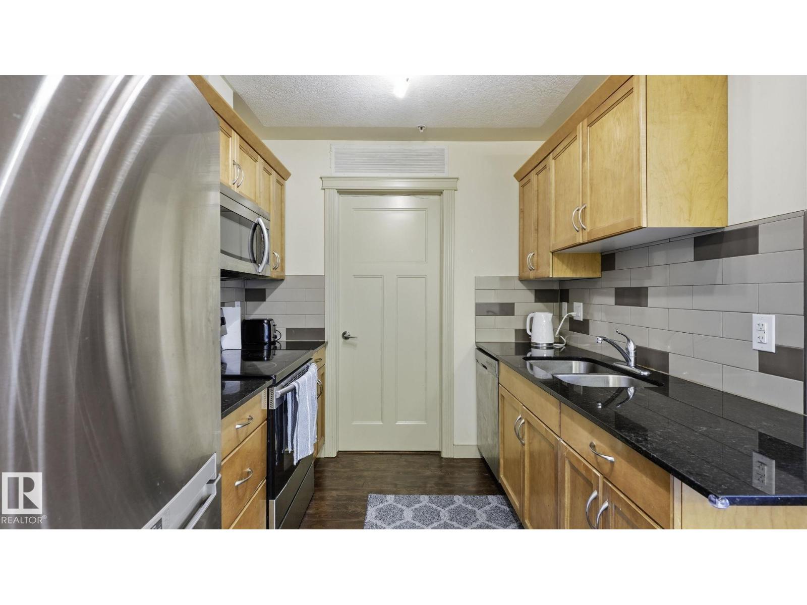 #303 16235 51 St NW NW photo 5 — MLS® E4498623