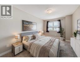 303, 250 Sage Valley Road NW - photo 20
