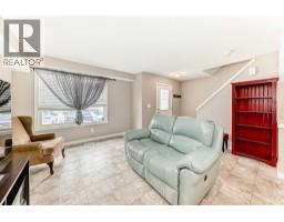 303, 250 Sage Valley Road NW - photo 18