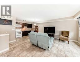 303, 250 Sage Valley Road NW - photo 14