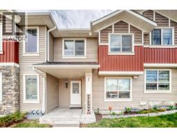 303, 250 Sage Valley Road NW - photo 2