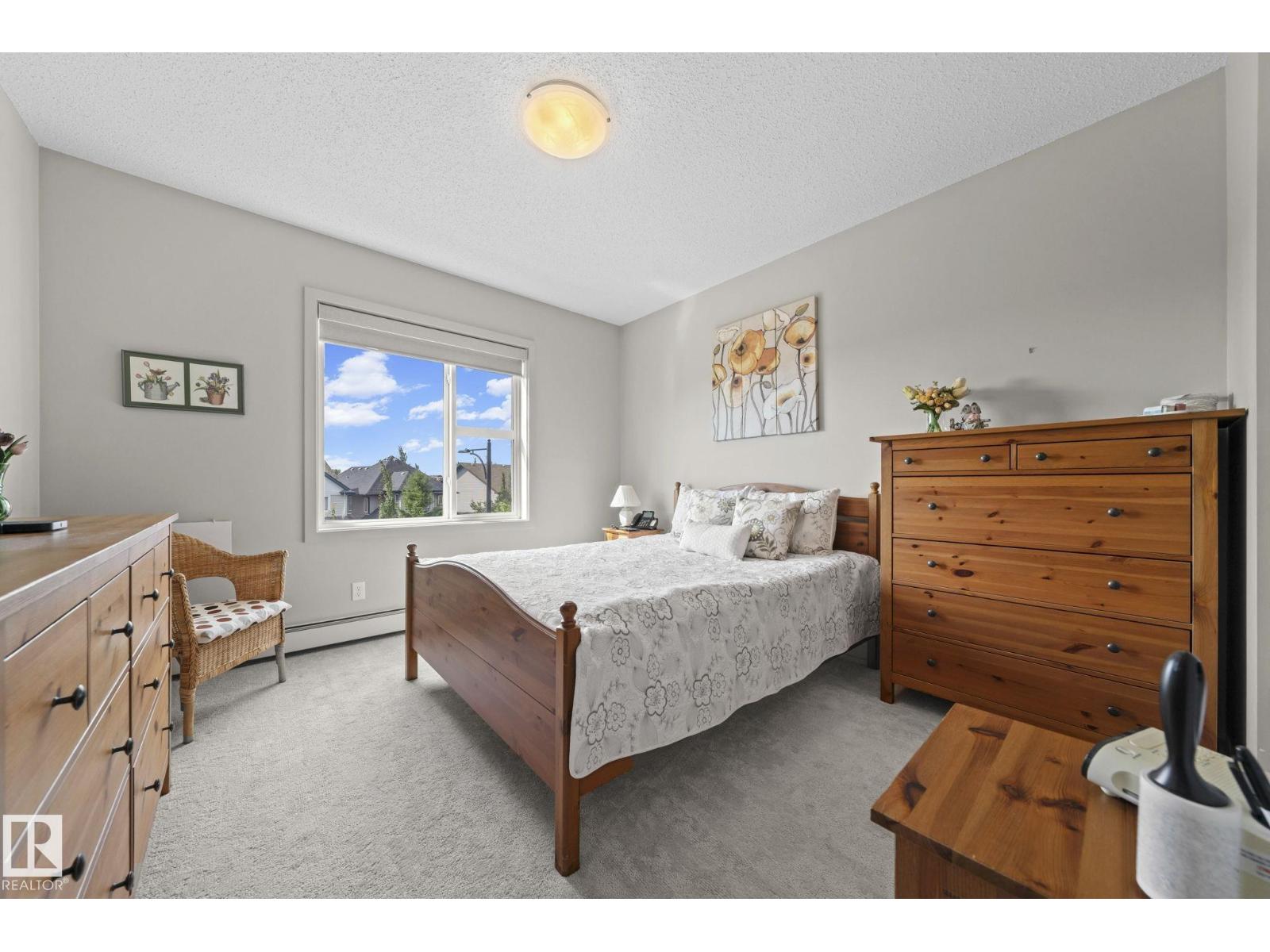 #301 320 Ambleside LI SW - 18