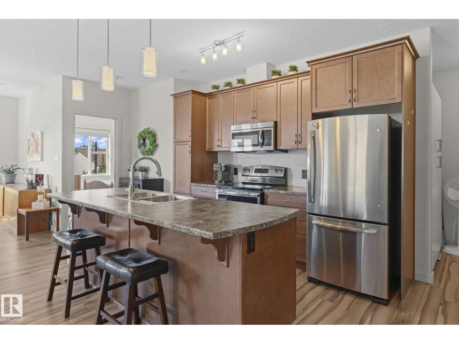 #301 320 Ambleside LI SW - Image 6